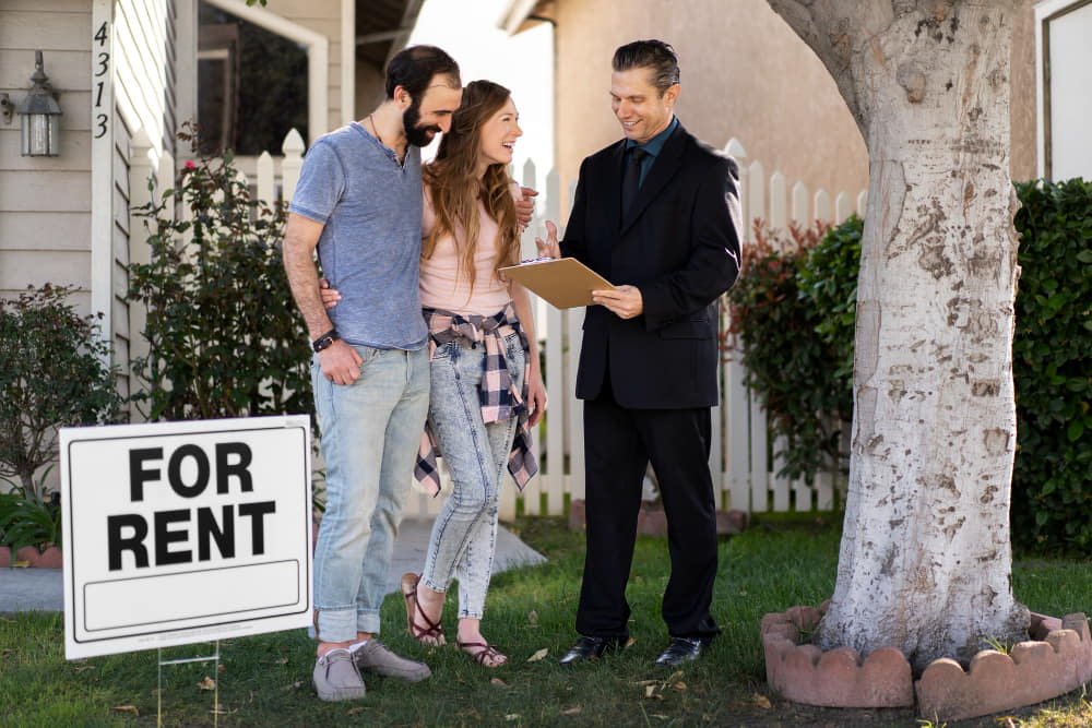 couple-signing-papers-for-new-house